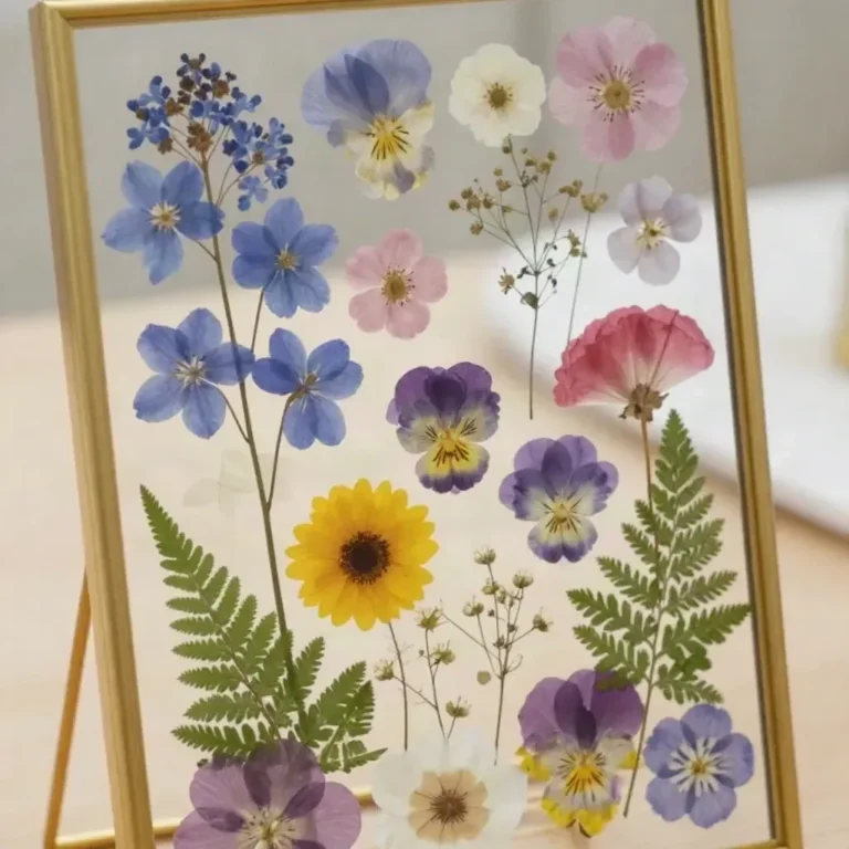 DIY pressed flower glass frame showcasing vibrant pressed blooms